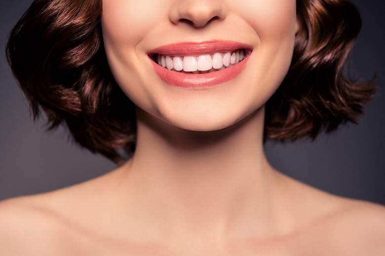 Woman with veneers in Toronto smiling