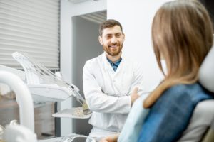 a patient during their dental implant consultation