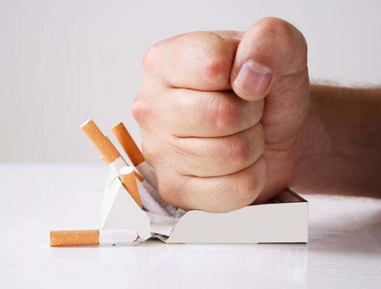 smashing cigarettes to promote dental implant care in Toronto