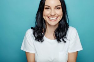 a patient smiling after receiving teeth whitening in Toronto